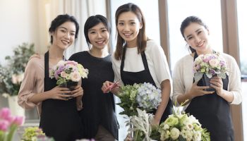 Young Chinese women learning flower arrangement